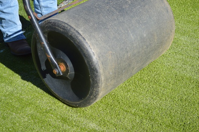 Toronto artificial grass installation - top layer rolled